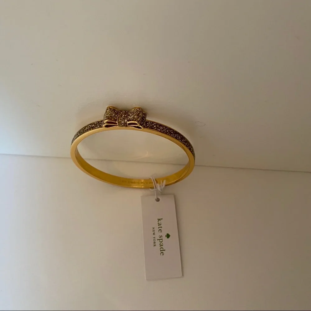 KATE SPADE NEW NWT BRACELET BANGLE GOLD PLATE GLITTER BOW MOON RIVER JEWELRY - Picture 5 of 7